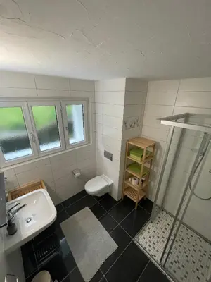Ein Badezimmer in der Unterkunft Apartments Soldanella