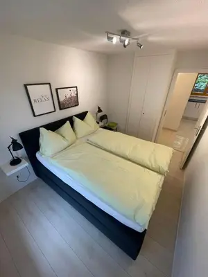 Ein Bett oder Betten in einem Zimmer der Unterkunft Apartments Soldanella