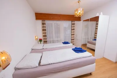 Ein Bett oder Betten in einem Zimmer der Unterkunft Haus City