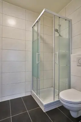 Ein Badezimmer in der Unterkunft Haus City