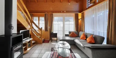Ein Sitzbereich in der Unterkunft Apartments Kirchbühl