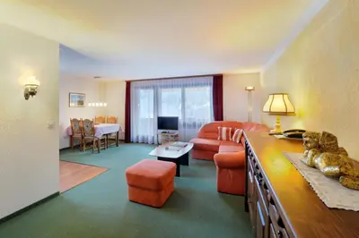 Ein Sitzbereich in der Unterkunft Apartments Kirchbühl