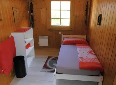 Ein Bett oder Betten in einem Zimmer der Unterkunft postman8 - Bed and Breakfast