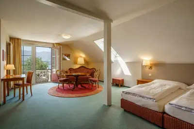 Ein Bett oder Betten in einem Zimmer der Unterkunft Schönbühl Hotel & Restaurant Lake Thun