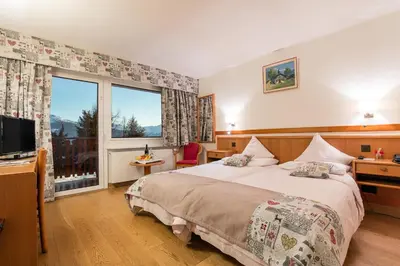 Ein Bett oder Betten in einem Zimmer der Unterkunft Hotel Ad'Eldorado