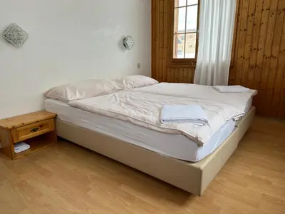 Ein Bett oder Betten in einem Zimmer der Unterkunft Hôtel - Petit-déjeuner Le Trift