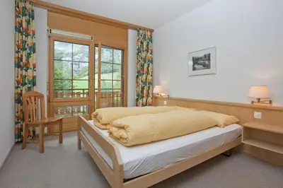 Ein Bett oder Betten in einem Zimmer der Unterkunft Les Naturelles