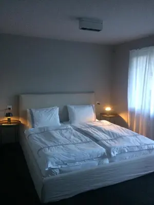 Ein Bett oder Betten in einem Zimmer der Unterkunft Le Bijou