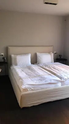 Ein Bett oder Betten in einem Zimmer der Unterkunft Le Bijou