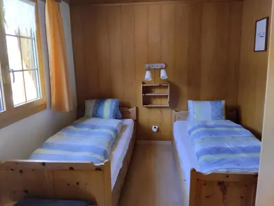 Ein Bett oder Betten in einem Zimmer der Unterkunft Chalet Gärlich