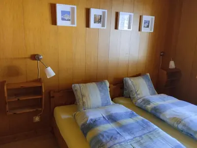 Ein Bett oder Betten in einem Zimmer der Unterkunft Chalet Gärlich