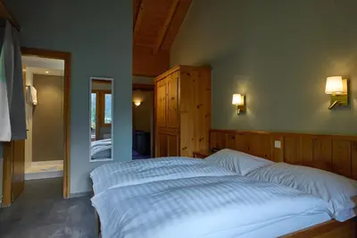 Ein Bett oder Betten in einem Zimmer der Unterkunft Hotel Europe
