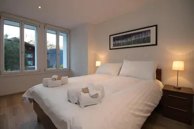 Ein Bett oder Betten in einem Zimmer der Unterkunft Hirschen Residence 2