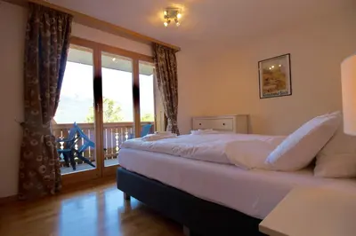 Ein Bett oder Betten in einem Zimmer der Unterkunft Chalet Fortuna 2