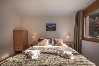 Ein Bett oder Betten in einem Zimmer der Unterkunft Chalet Am Acher 7