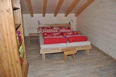 Ein Bett oder Betten in einem Zimmer der Unterkunft Laubrinus
