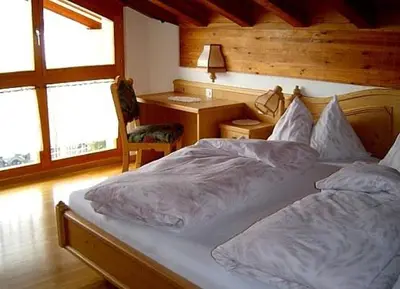 Ein Bett oder Betten in einem Zimmer der Unterkunft Haus Adora