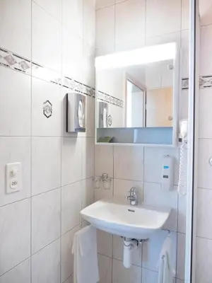 Ein Badezimmer in der Unterkunft Hotel Olympica