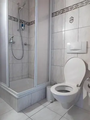 Ein Badezimmer in der Unterkunft Hotel Olympica