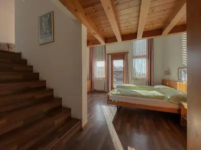 Ein Bett oder Betten in einem Zimmer der Unterkunft Hotel Aeschi Park