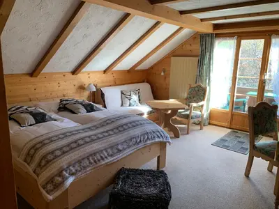 Ein Bett oder Betten in einem Zimmer der Unterkunft Hotel Wildhorn