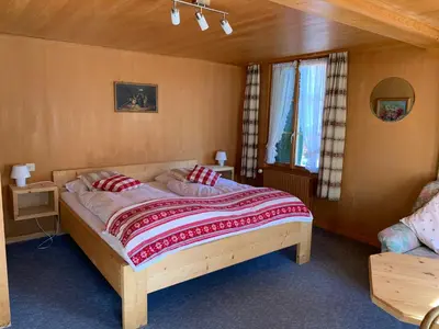 Ein Bett oder Betten in einem Zimmer der Unterkunft Hotel Wildhorn