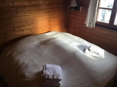 Ein Bett oder Betten in einem Zimmer der Unterkunft Magnifique chalet pour 10 personnes à Vercorin