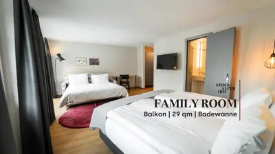 Ein Bett oder Betten in einem Zimmer der Unterkunft Hotel Stockalperhof