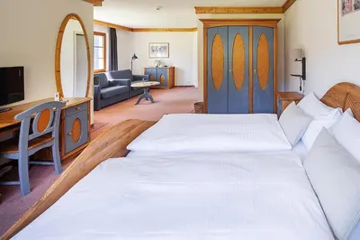 Ein Bett oder Betten in einem Zimmer der Unterkunft Hotel Bodmi