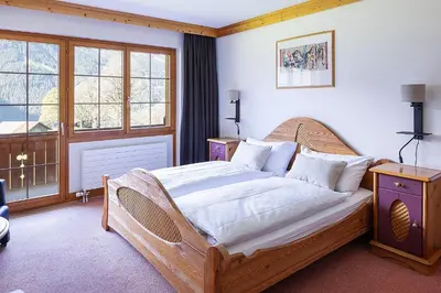 Ein Bett oder Betten in einem Zimmer der Unterkunft Hotel Bodmi