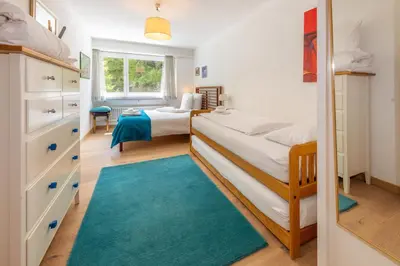 Ein Bett oder Betten in einem Zimmer der Unterkunft Haus Sonnheim