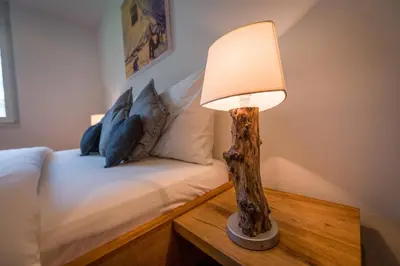 Ein Bett oder Betten in einem Zimmer der Unterkunft Casa Della Vita by Zermatt Premium Apartments