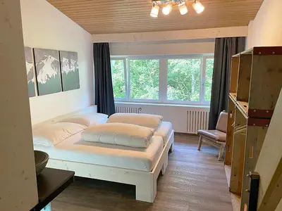 Ein Bett oder Betten in einem Zimmer der Unterkunft Hotel GO-IN