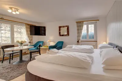 Ein Bett oder Betten in einem Zimmer der Unterkunft Good Value Apartments by MX Zermatt