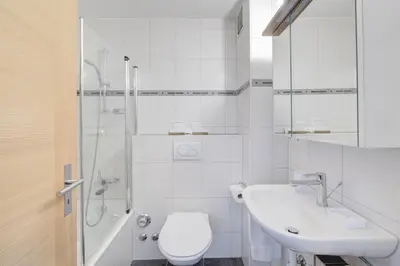 Ein Badezimmer in der Unterkunft Good Value Apartments by MX Zermatt