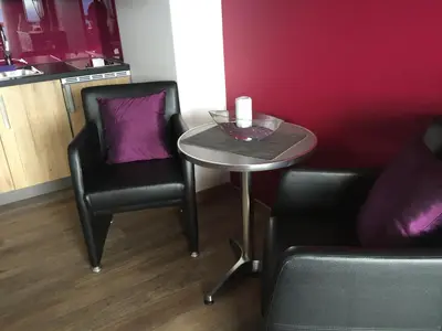 Ein Sitzbereich in der Unterkunft Apartments Seeblick mit Anbindung an ein 4-Sterne-Hotel