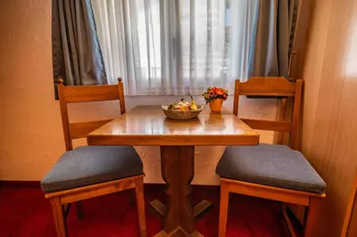 Ein Sitzbereich in der Unterkunft Hotel Weisshorn