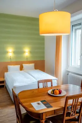 Ein Bett oder Betten in einem Zimmer der Unterkunft Hotel Haus Schönstatt contactless-Check-In