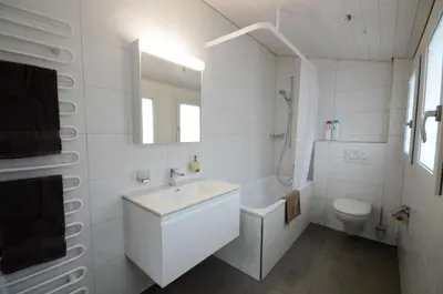 Ein Badezimmer in der Unterkunft Interlaken Central 2
