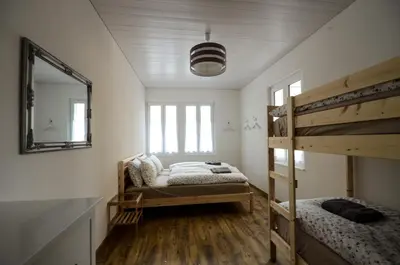 Ein Bett oder Betten in einem Zimmer der Unterkunft Interlaken Central 2