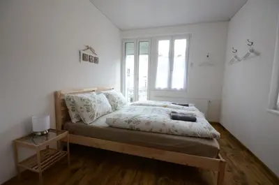 Ein Bett oder Betten in einem Zimmer der Unterkunft Interlaken Central 3