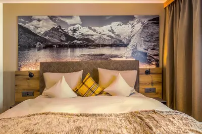 Ein Bett oder Betten in einem Zimmer der Unterkunft Arcade Apartments & Spa