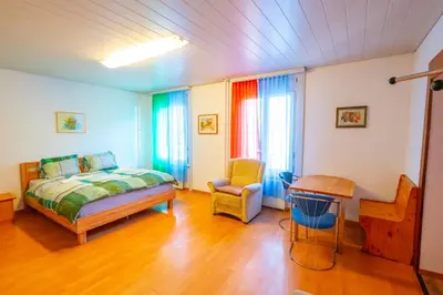 Ein Bett oder Betten in einem Zimmer der Unterkunft Residence Villa Flora