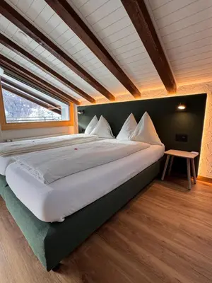 Ein Bett oder Betten in einem Zimmer der Unterkunft Hotel Plateau Rosa