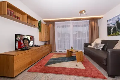 Ein Sitzbereich in der Unterkunft Apartment Aura