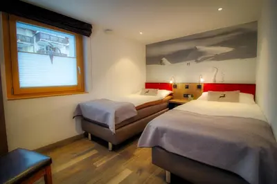 Ein Bett oder Betten in einem Zimmer der Unterkunft Chalet Abacus