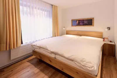 Ein Bett oder Betten in einem Zimmer der Unterkunft Jolimont Apartments