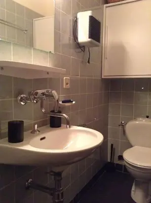 Ein Badezimmer in der Unterkunft appartamento Melezes