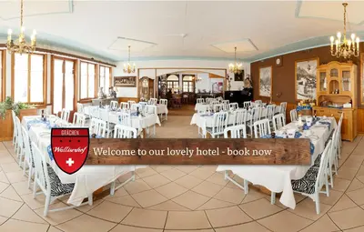 Ein Restaurant oder anderes Speiselokal in der Unterkunft Hotel Walliserhof - The Dom Collection