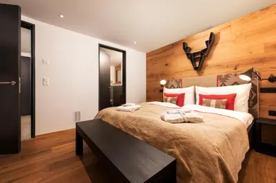 Ein Bett oder Betten in einem Zimmer der Unterkunft Chalet Nepomuk